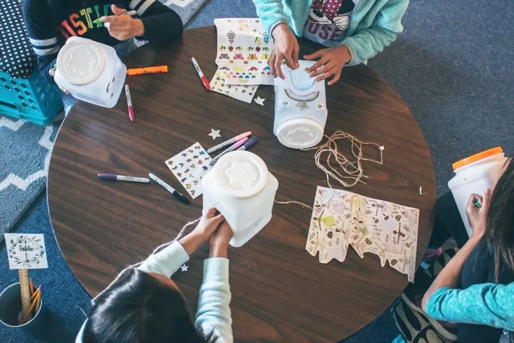 Henkel Sustainability Ambassadors from the Walmart sales office in Bentonville, AR helped fourth graders at Jones Elementary build birdhouses from recyclable materials.