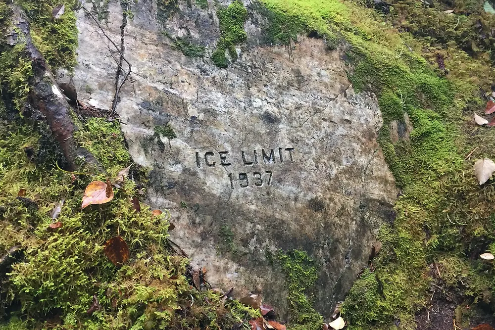 Mendenhall Glacier in Juno, Alaska where the ice limit marked in 1937 shows no ice anymore