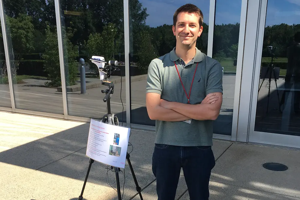 Philippe Huber, Product Development Equipment Engineer in Rocky Hill, USA, with the hands-free thermometer