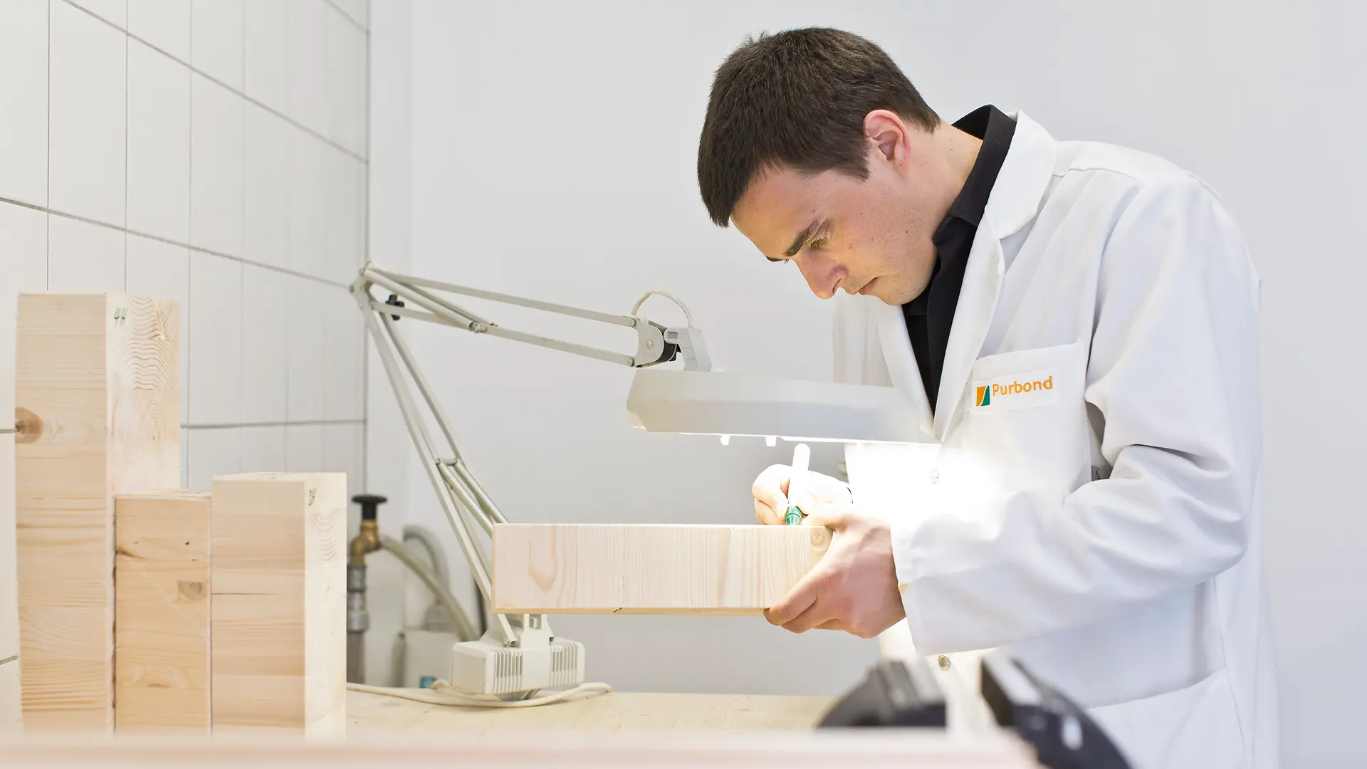 Employee working with mass timber