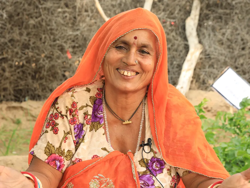 An Indian woman holds a training session.