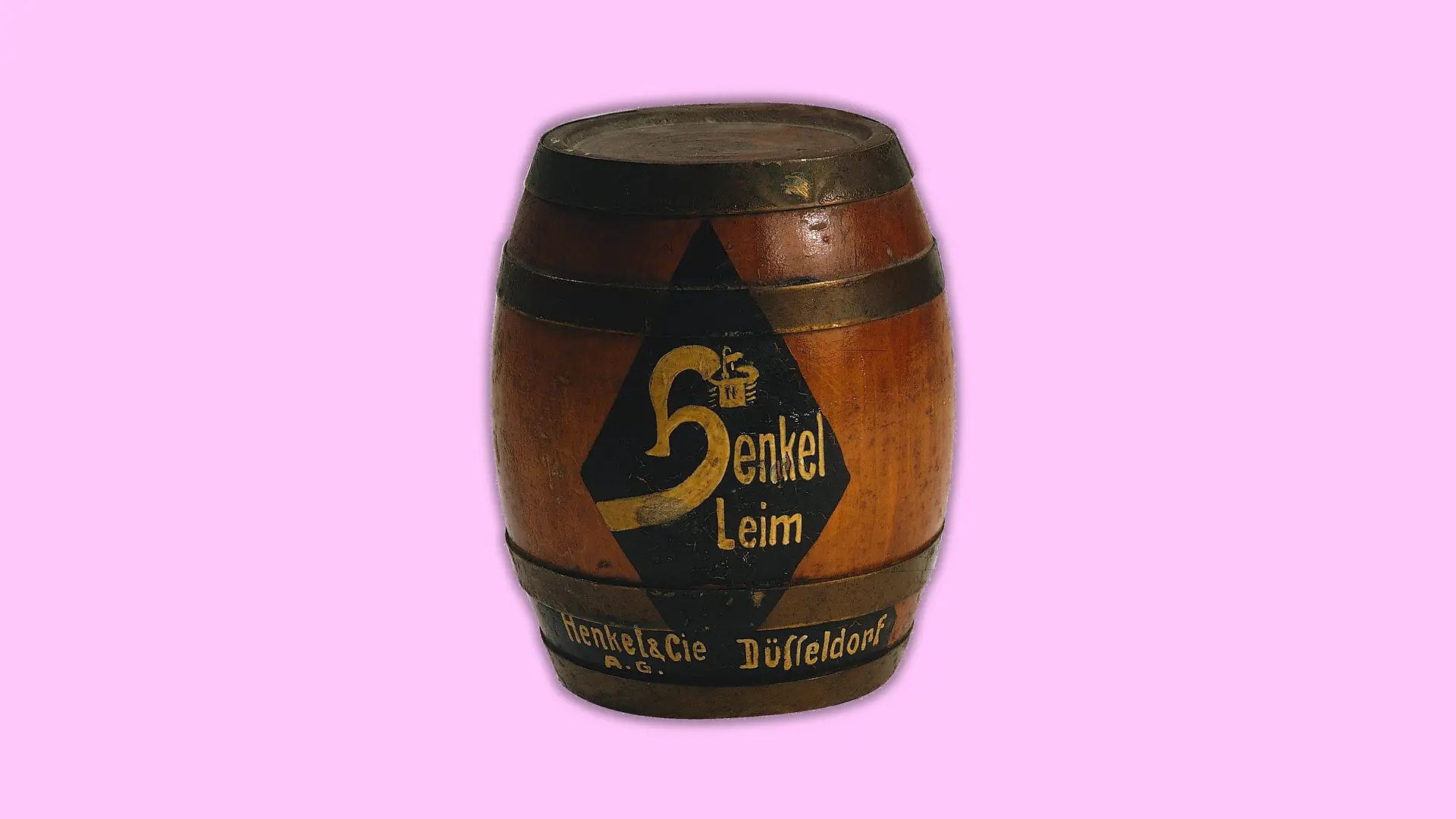 Miniature replica of a printed Henkel glue drum from 1925.