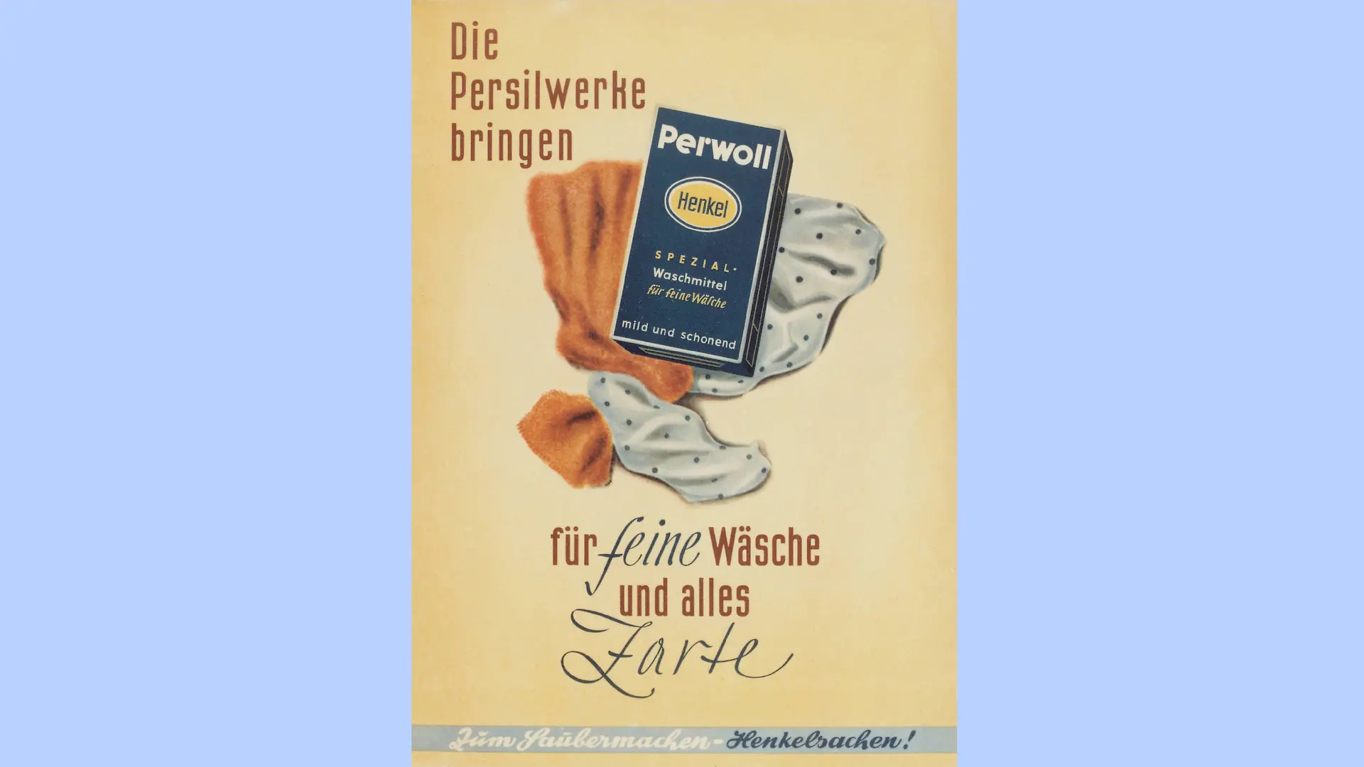 A package of Perwoll detergent is positioned in the center of the poster, standing in front of two pieces of clothing. Across the top portion, the text reads: “Die Persilwerke bringen für feine Wäsche und alles Zarte” (“The makers of Persil present [a product] for fine laundry and all delicate items”). At the bottom, the slogan “Zum Säubermachen – Henkelsachen!” (“For cleaning – Henkel products!”) is displayed.