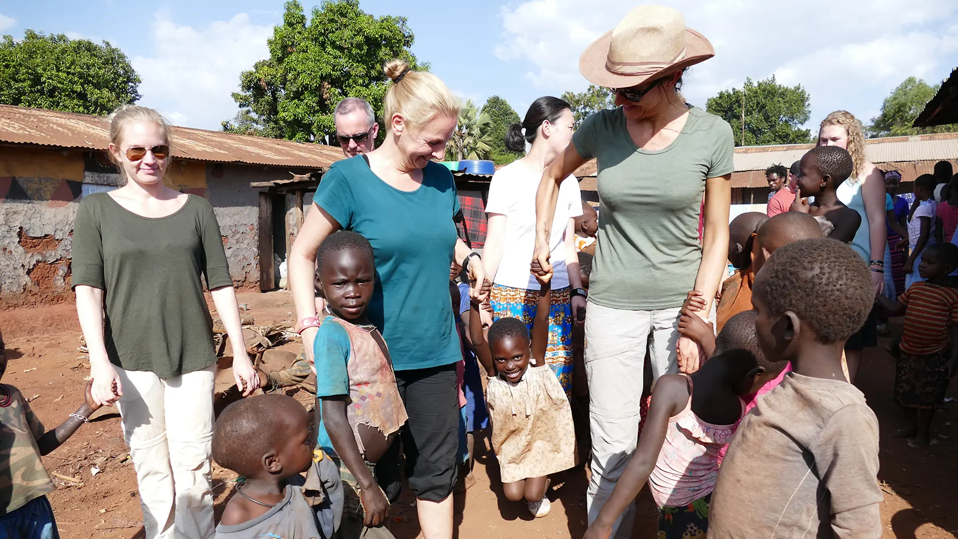 Playing with the visitors in Masese 